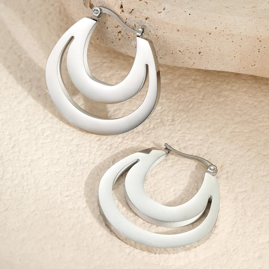 Geometric French earrings with round hoop design in gold and steel colour options