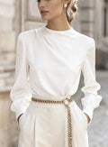 Women's solid colour pleated high-neck lantern sleeve blouse in black, front view