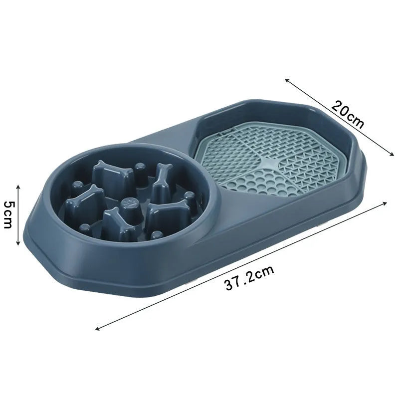 Blue interactive slow feeder dog bowl with maze pattern for anti-gulping, shown with four non-slip pads.