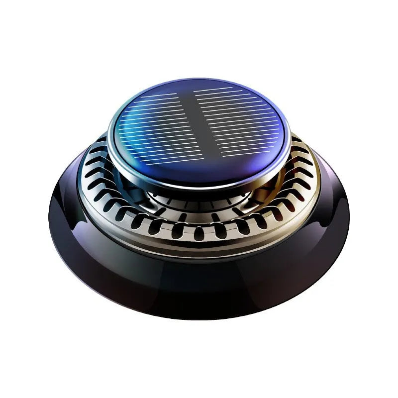 Black solar-powered kinetic double ring car air freshener diffuser on a car dashboard.