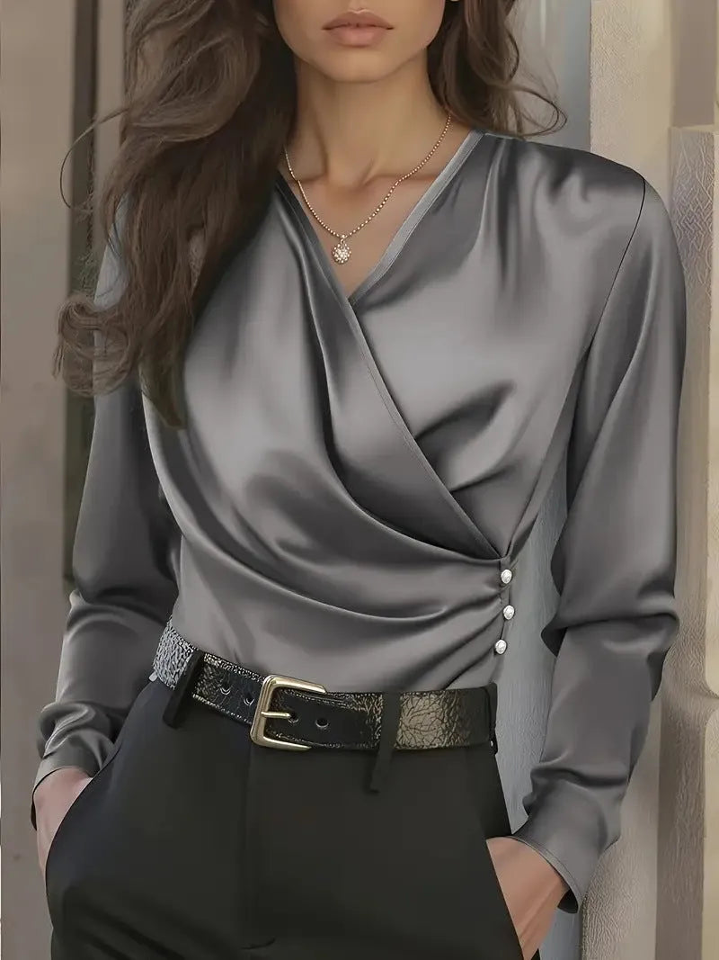 Women's v-neck slim fit polyester shirt in white with patchwork detail, long sleeves, and pullover style