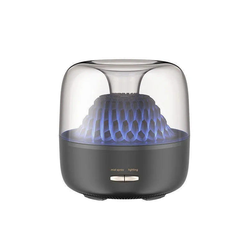 Round resin household aroma diffuser with colourful light on a desktop in beige colour