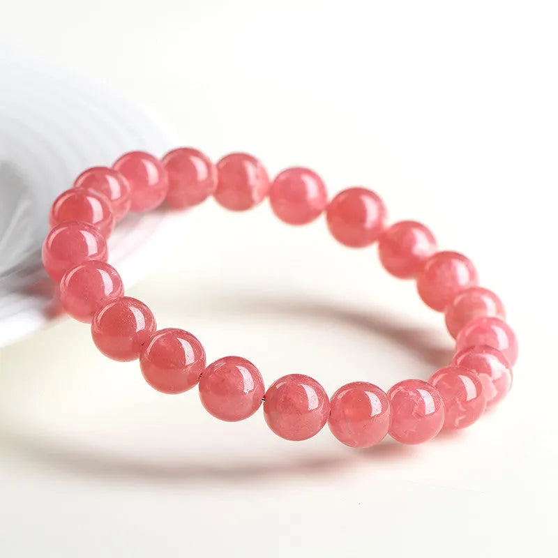 Women's geometric crystal bracelet with longevity lock fastening in rhodochrosite colour with multiple bead size options