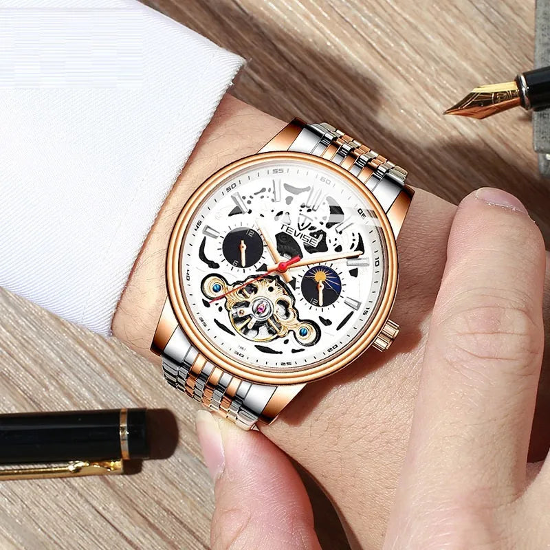 Men's black dial mechanical tourbillon watch with luminous hands on a stainless steel bracelet.