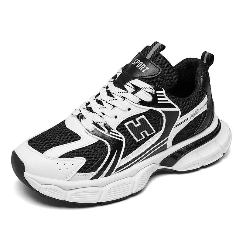 Men's white and grey mesh running shoes with a round toe and plastic sole on a plain background.
