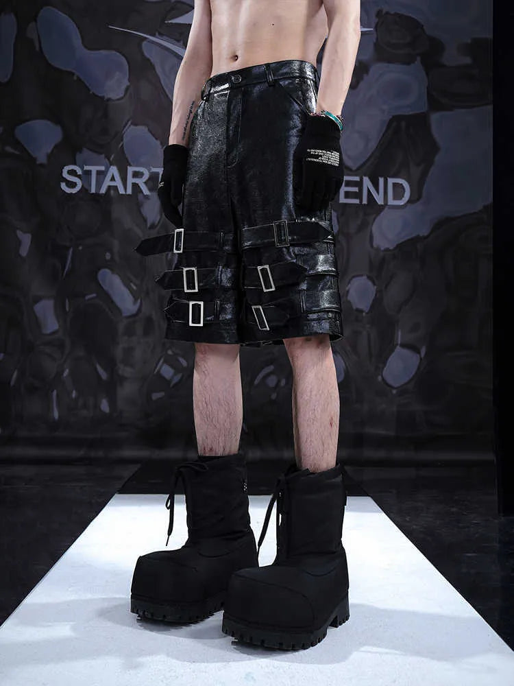 Black men's spandex leather-look shorts with a cropped, casual fit and medium-low waist.