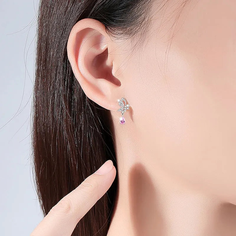 Silver butterfly stud earrings with crystal details on 925 sterling silver