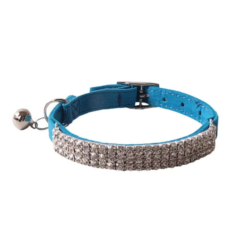 Flannel cat collar with elastic buckle and gang drill detail in assorted colours.