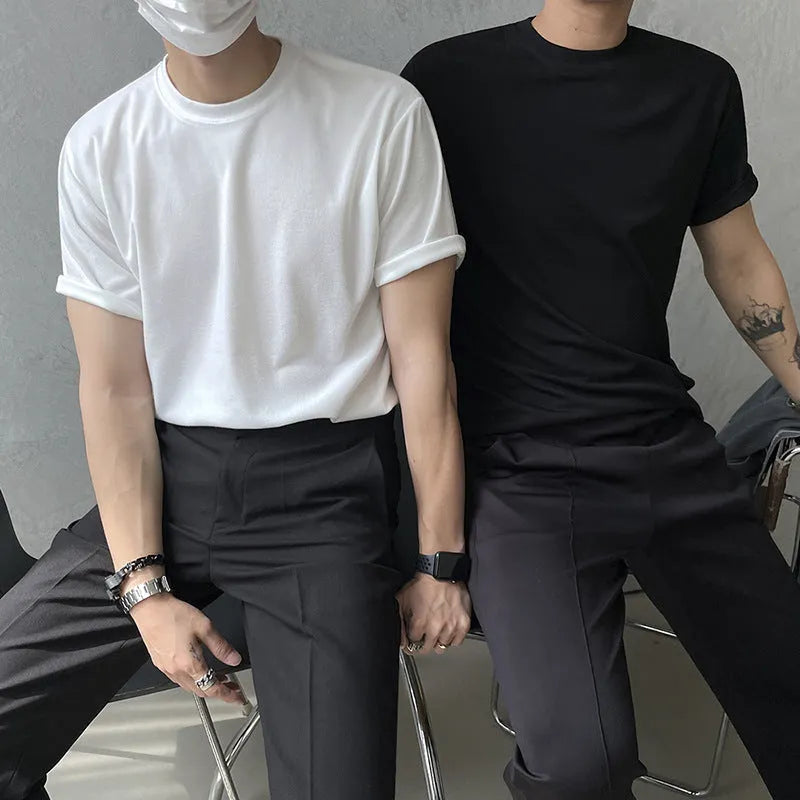 Men's slim fit cotton t-shirt in solid white or black with half sleeves and round neck