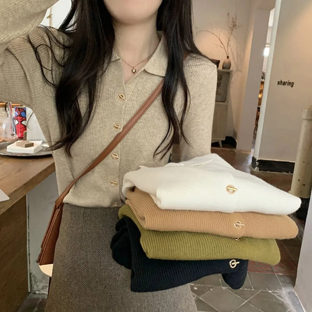 Women's beige loose-fit long-sleeved viscose knitted cardigan shown open as a layering piece.