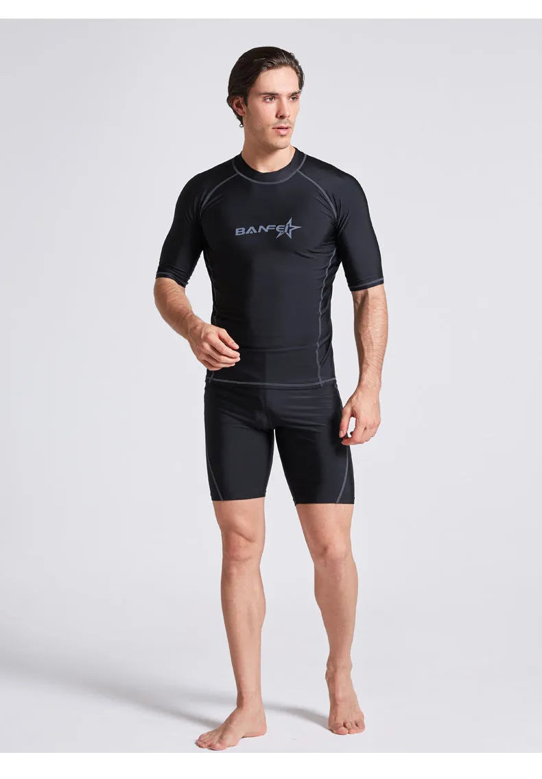 Men's navy blue quick-dry nylon swimsuit set with half sleeves and long swim pants