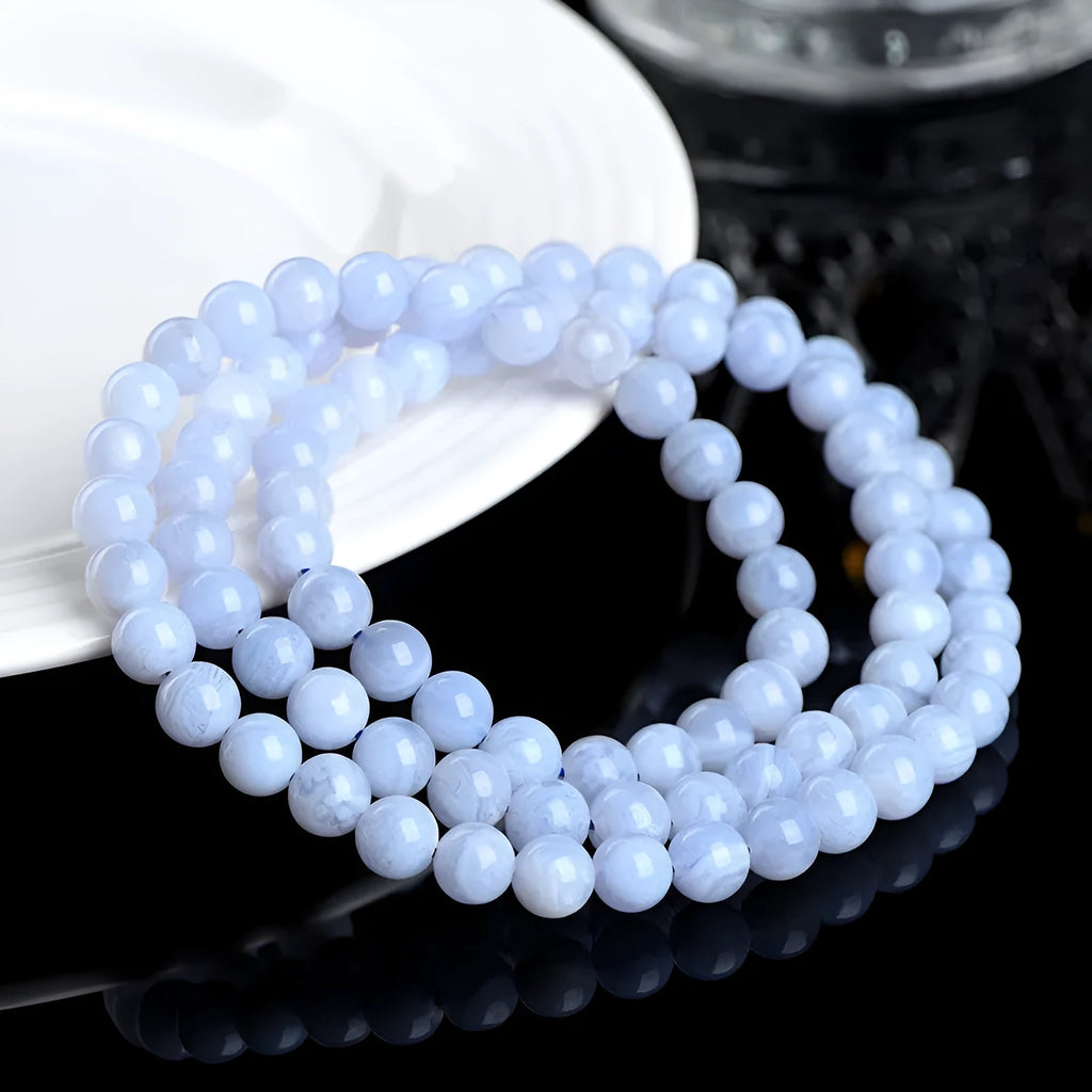 Blue agate bracelet with natural multi-circle pattern and Ruyi elements on wrist
