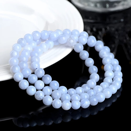 Blue agate bracelet with natural multi-circle pattern and Ruyi elements on wrist