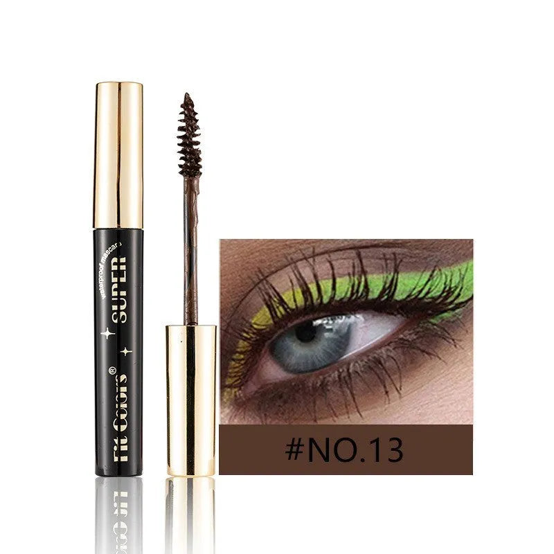 Colourful mascara tube and wand with vibrant shades for dramatic Christmas and stage eye makeup.