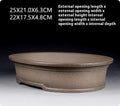 Handmade purple sand ceramic oval bonsai flower pot showing antique finish and 25cm length.