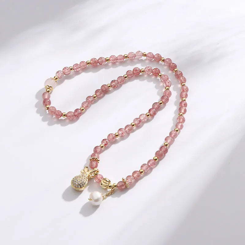 Women's geometric strawberry quartz crystal bracelet with adjustable fitting for money drawing