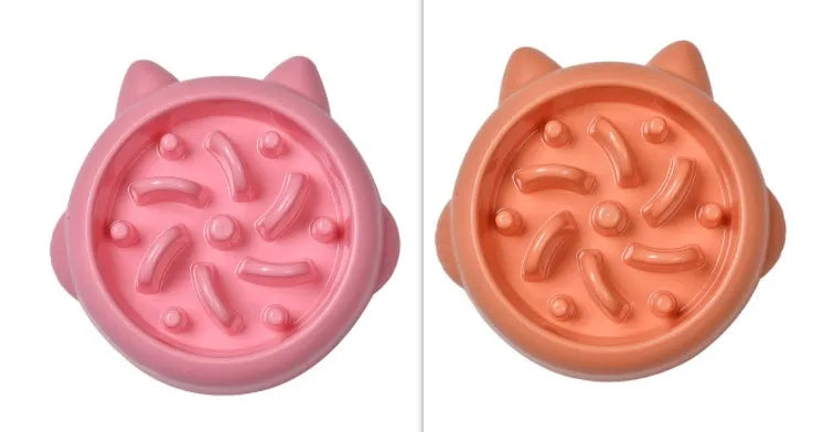 Green pet slow feeder bowl with raised bone-shaped obstacles inside to slow down eating.