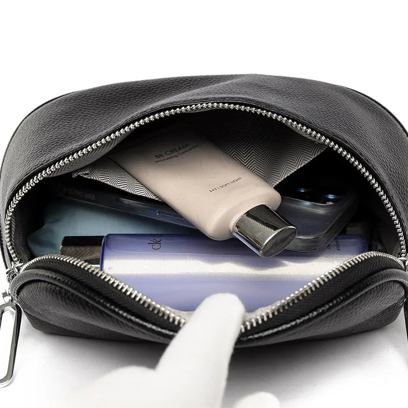 Women's soft PU messenger bag in saddle shape with single shoulder strap and internal organisation