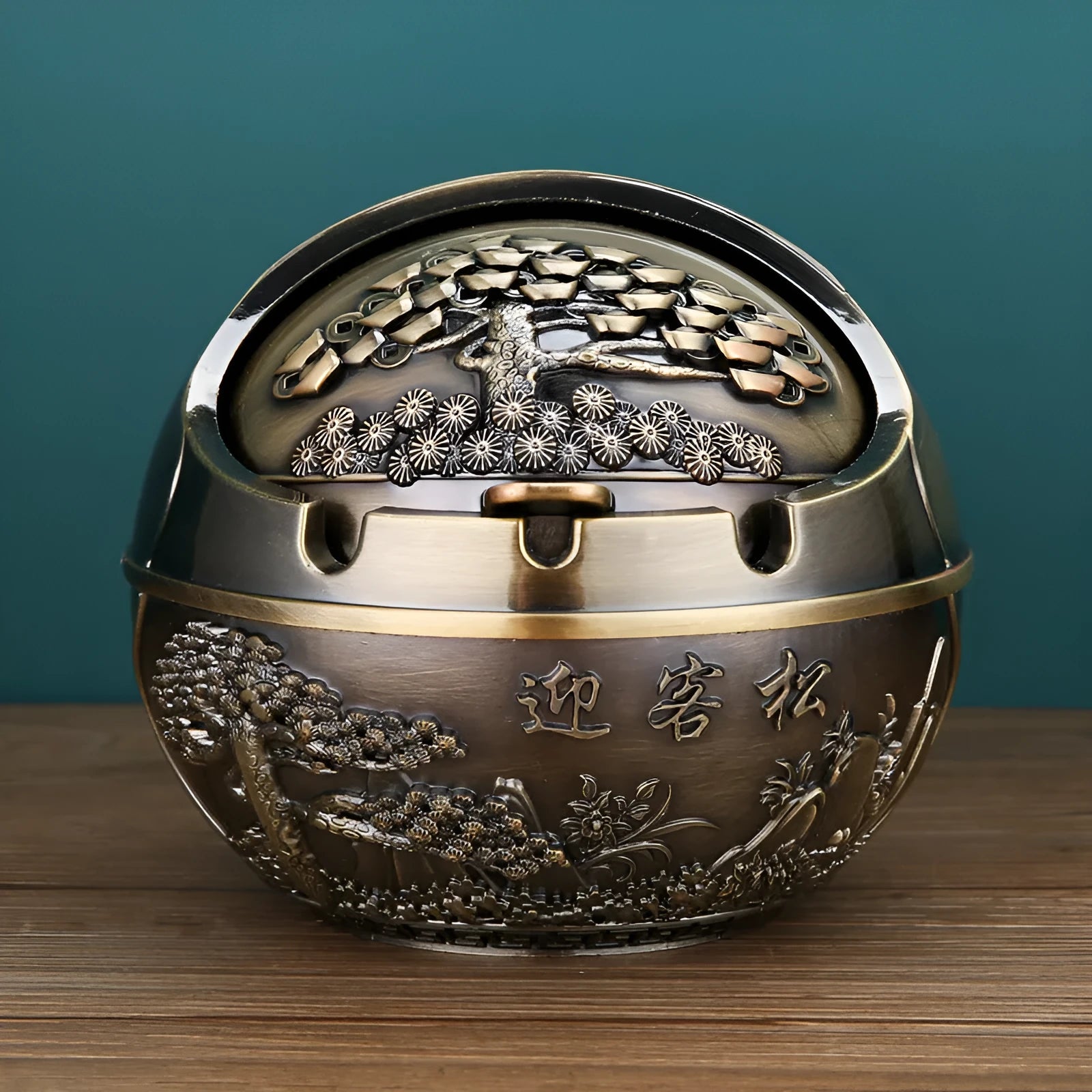 Creative alloy ashtray in bronze with smoke extinguishing slot, featuring a detailed Money Tree design.