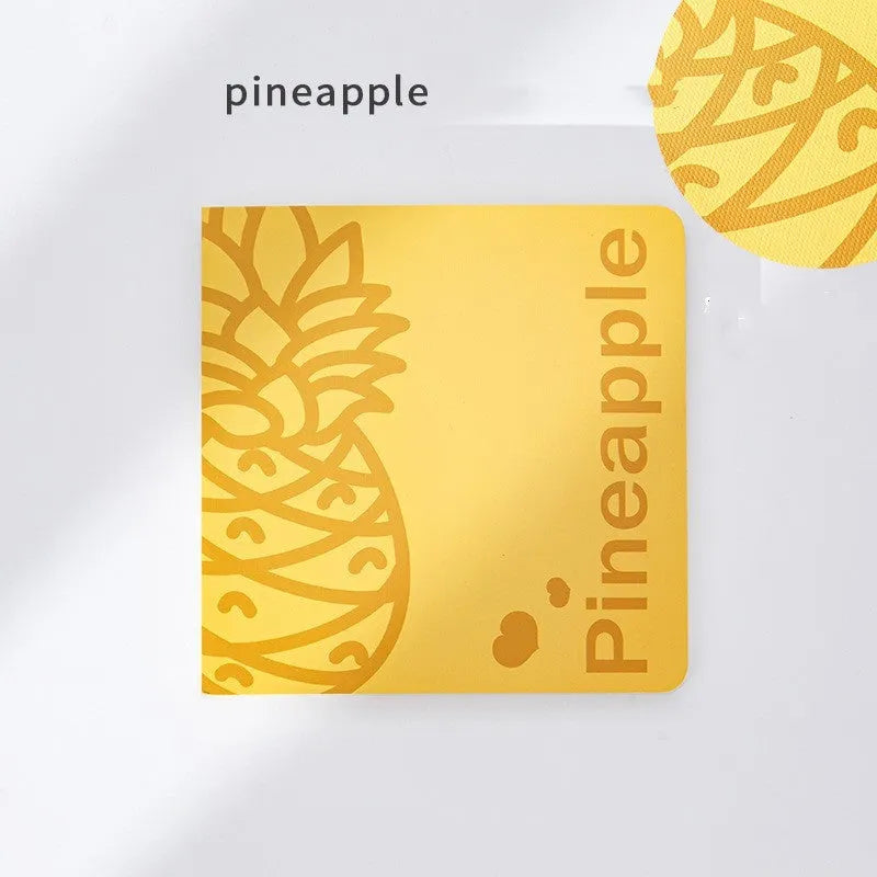 Square fruit design notebook showing embossed pineapple, blueberry, grape, and peach cover options.