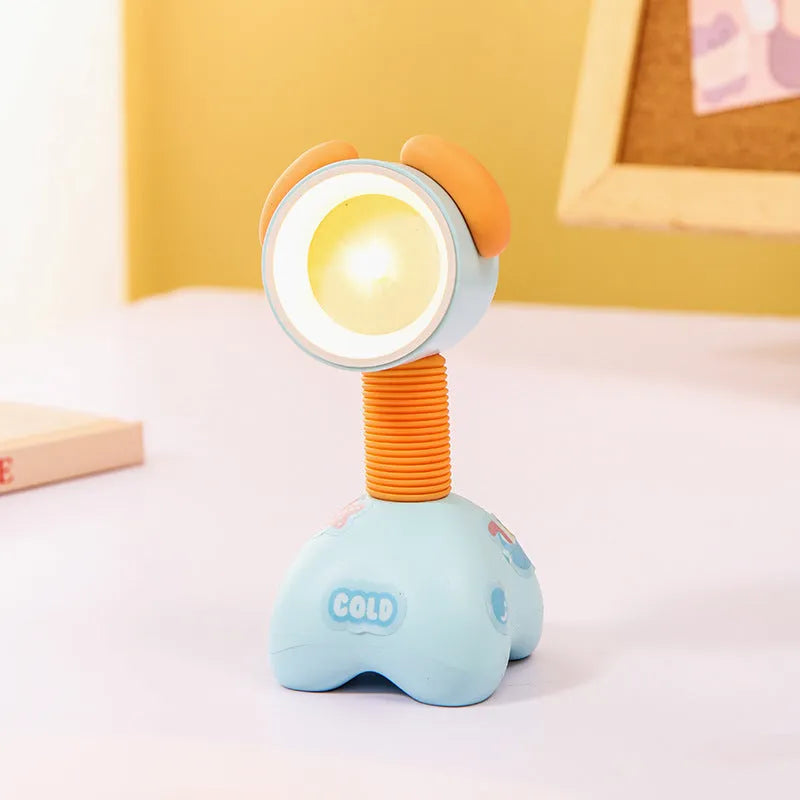 Cartoon animal magnetic night lamp with adjustable head on metallic surface