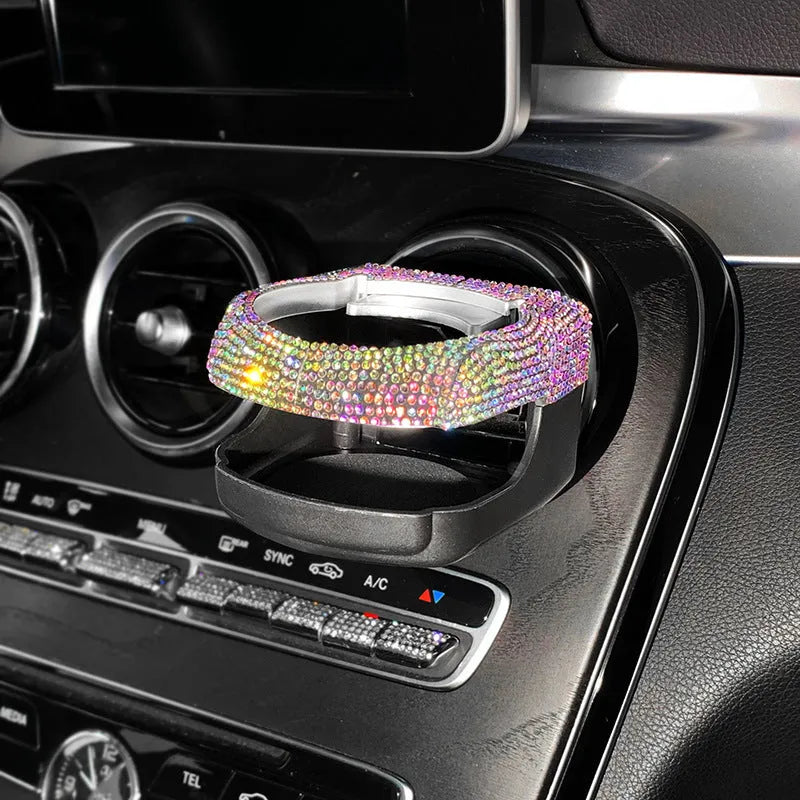 White rhinestone-decorated car cup holder bracket mounted on a car air vent