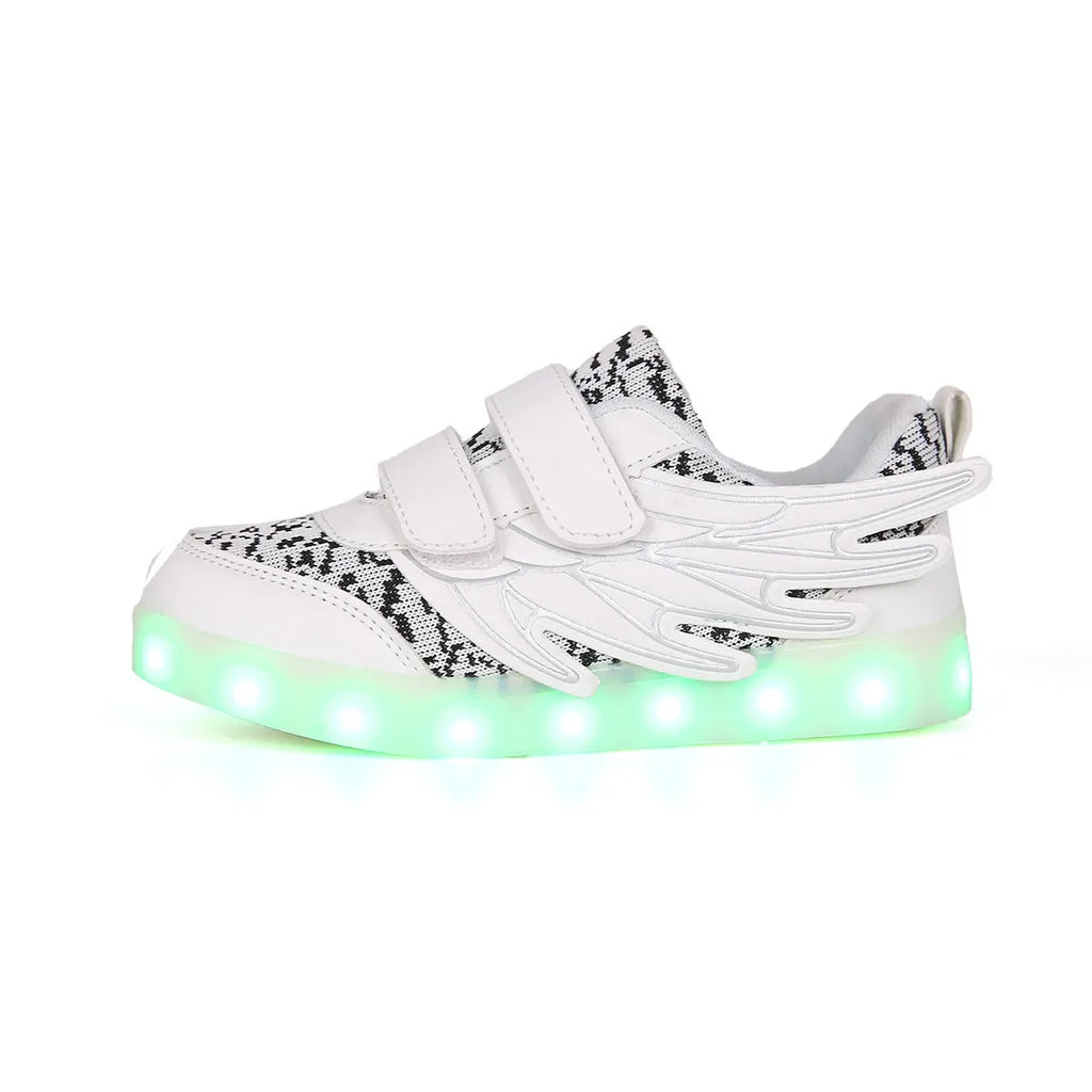Children's plum red and white LED light-up sneakers with USB charging port visible