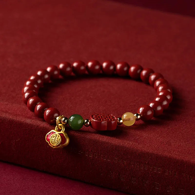 Chinese-style cinnabar bracelet with emperor sandstone beads and fu character design