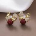 Beizhu zircon gold plated red high colour preserving stud earrings on white background