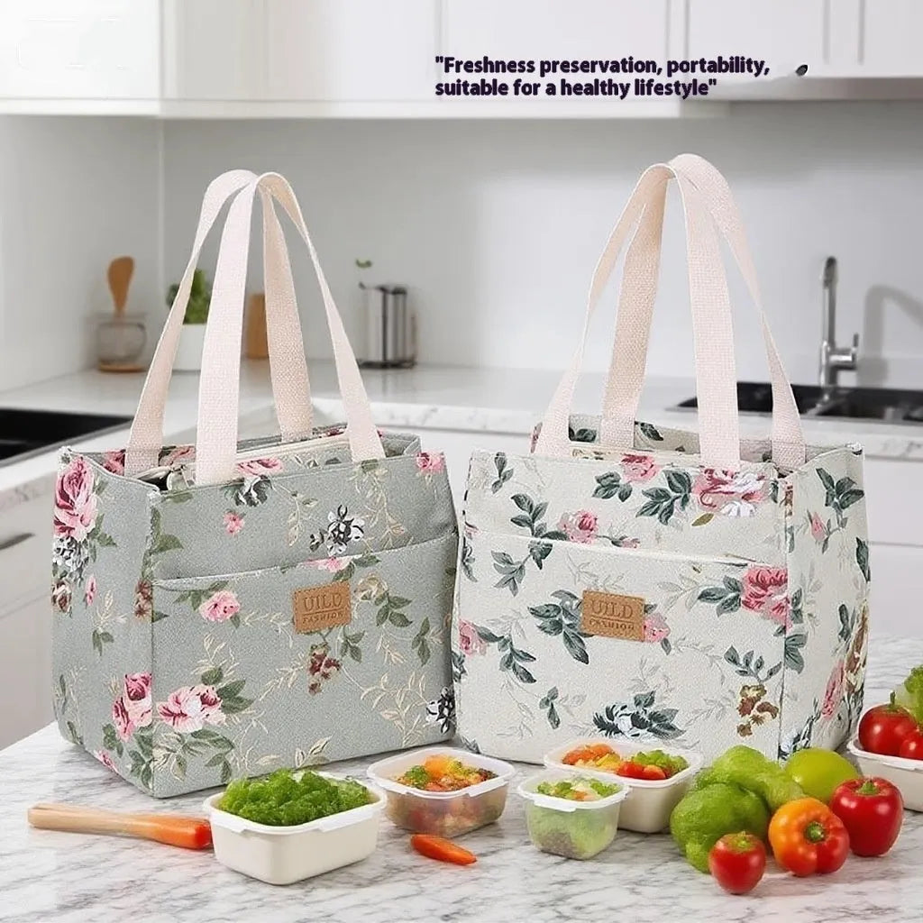 Women's printed canvas handbag with floral design and aluminium hardware in square shape