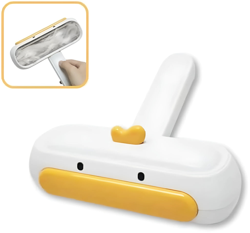White portable pet hair remover roller with a yellow cartoon duck design on a table.