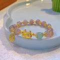 Women's floral glazed bracelet with ice crack texture and zodiac animal charm on wrist.