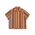 Ethnic style woven shirt with Cuban collar and contrast colours, shown in a loose fit with short sleeves.