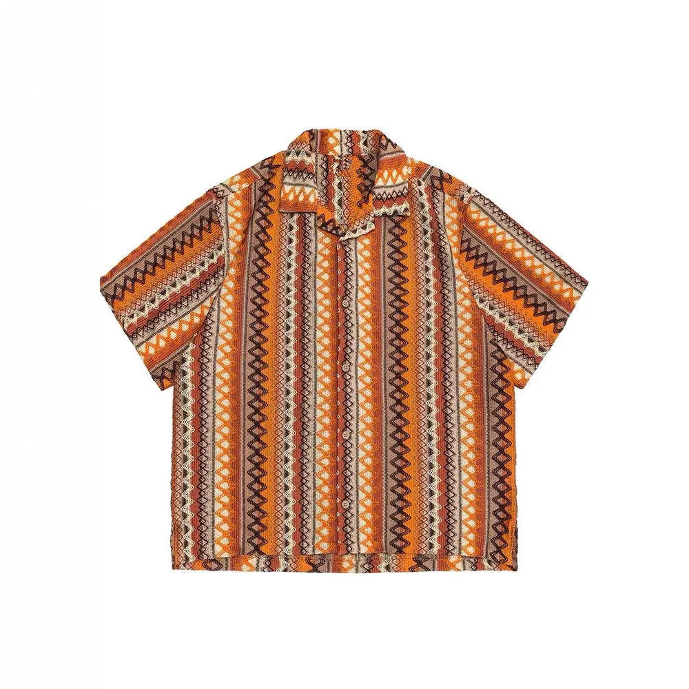 Ethnic style woven shirt with Cuban collar and contrast colours, shown in a loose fit with short sleeves.