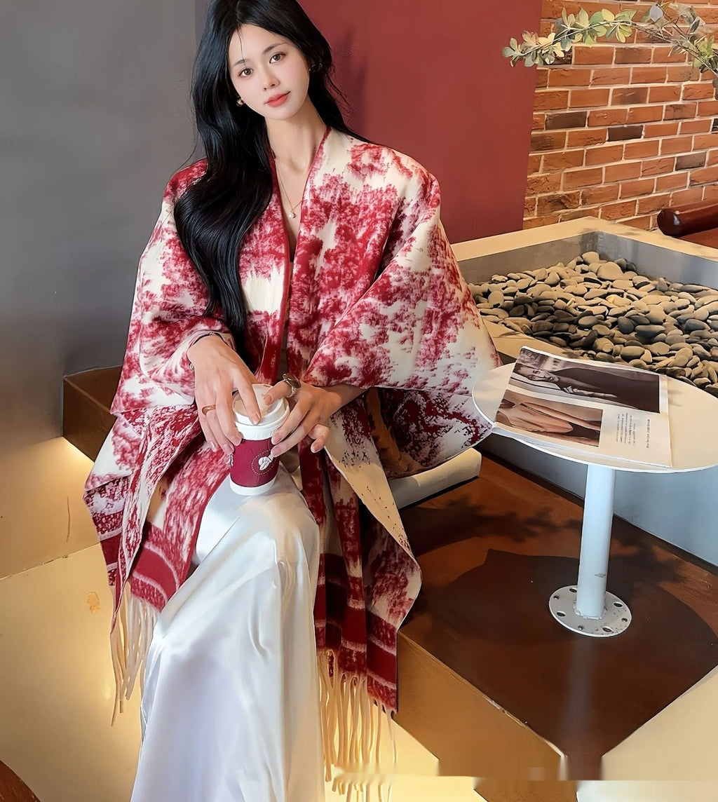 Women's casual polyester scarf cape with tassels worn as a shawl.