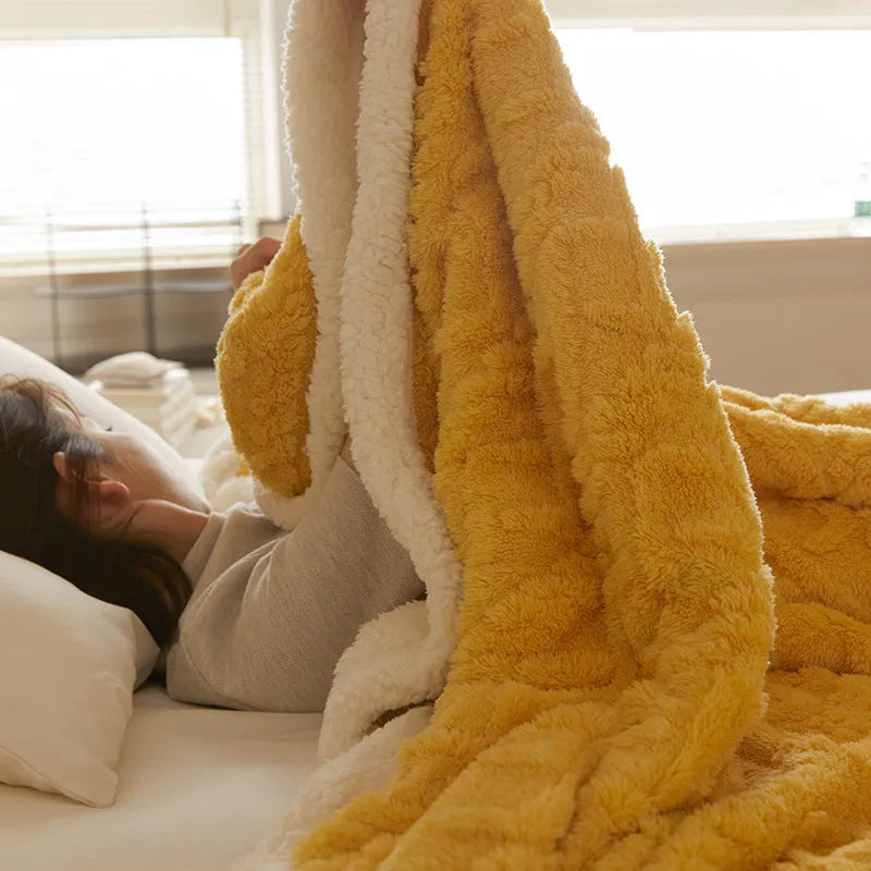 Polyester thermal flannel blanket in tea green colour on bed