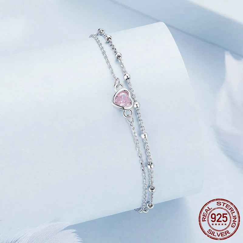 Women's sweet style 925 sterling silver bracelet with a 6mm heart pendant on an adjustable chain.