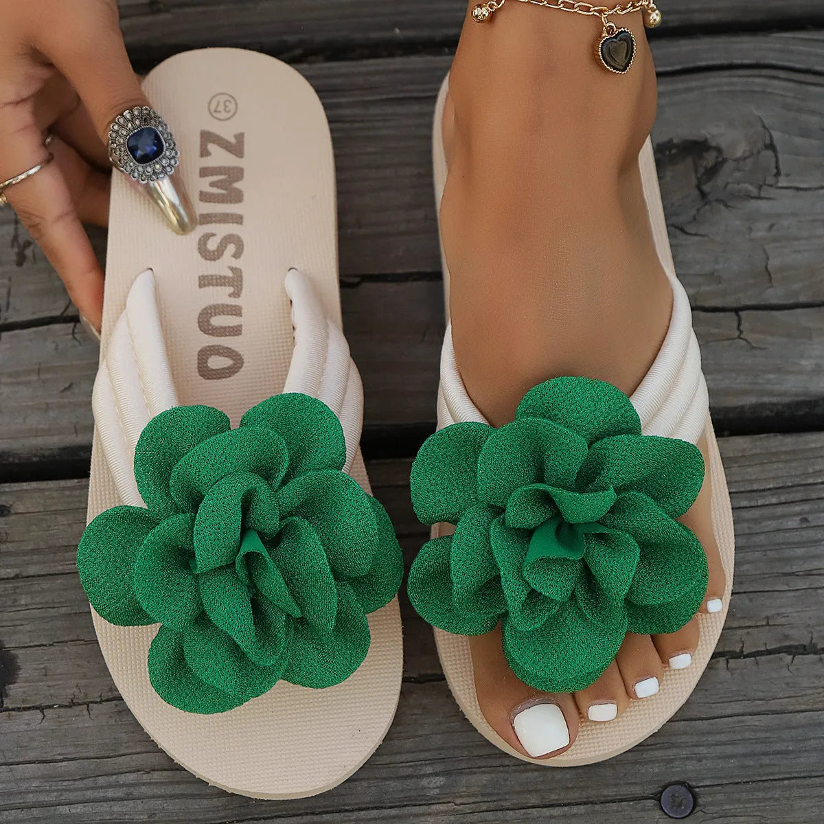Women's floral print PU flip-flop slippers in green, available in sizes 36 to 43