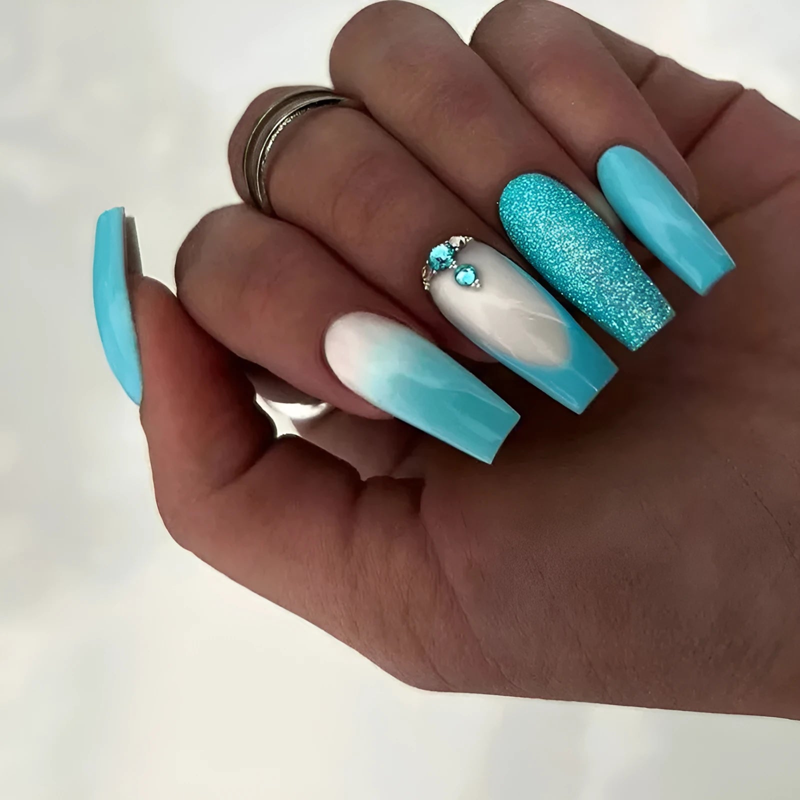 Blue false nails with diamond glitter accents in ballet shape, includes patches and glue