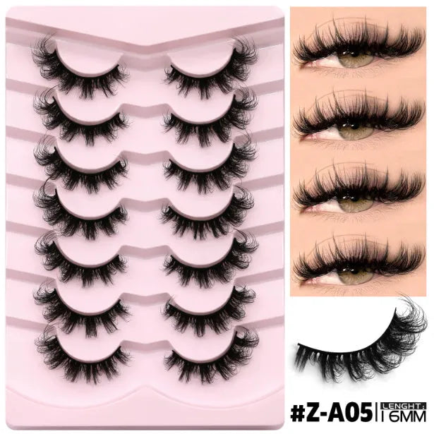 Box of natural long, thick false eyelashes made from artificial fibre with included glue tube.
