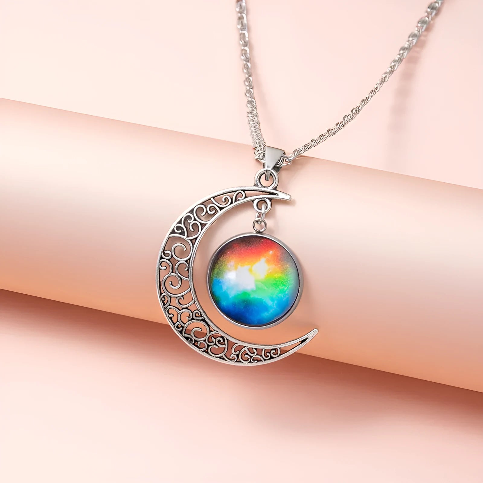 Silver hollow moon pendant necklace with glass star insert on Figaro chain for women