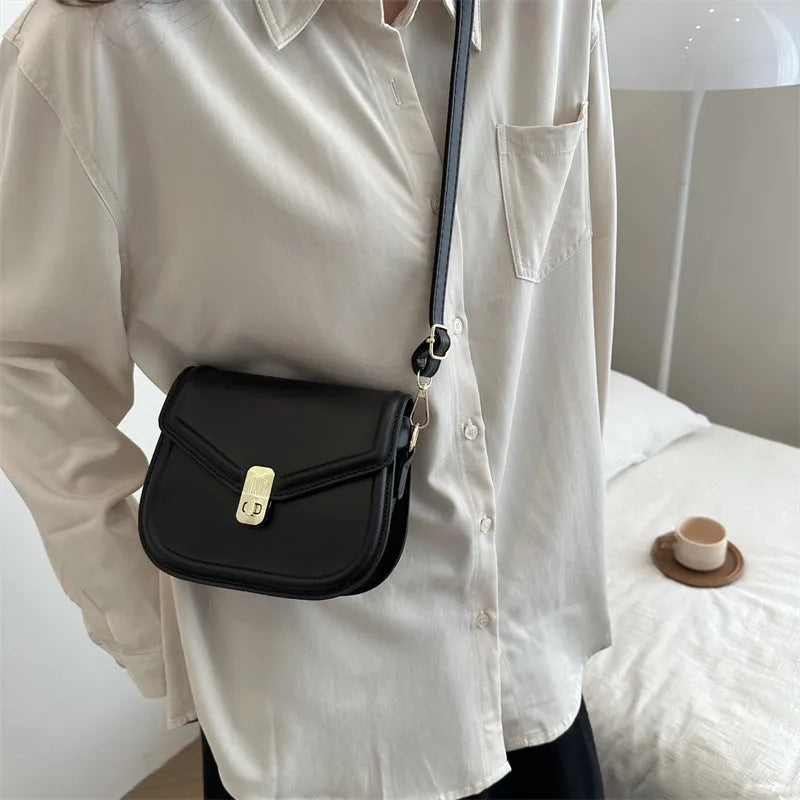 Unisex PU leather clamshell shoulder messenger bag in horizontal square design with adjustable strap