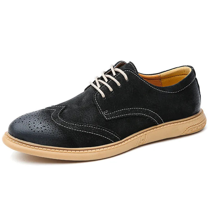 Men's black leather low-top lace-up business shoes with a rubber sole on a plain background.