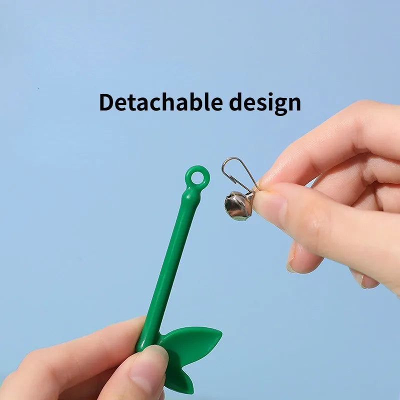 Green cat feather wand toy with bell and feather attachments for interactive play