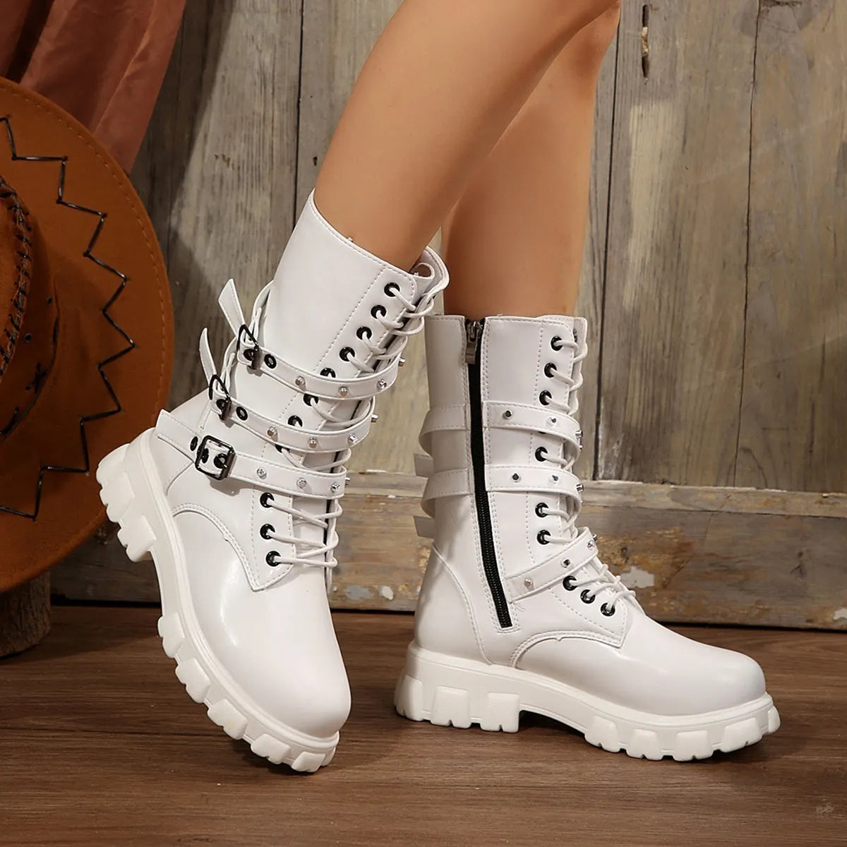 Women's black mid-calf knight boots with metal buckles and side zipper
