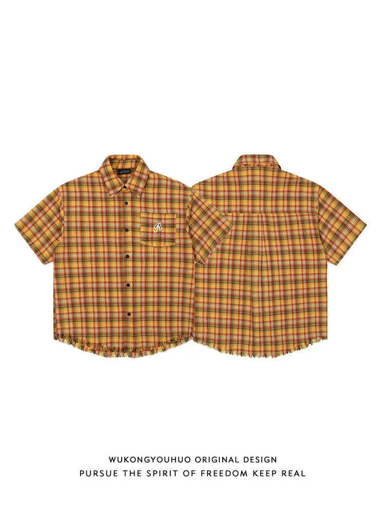 Yellow checked button-down shirt with embroidered pocket on chest