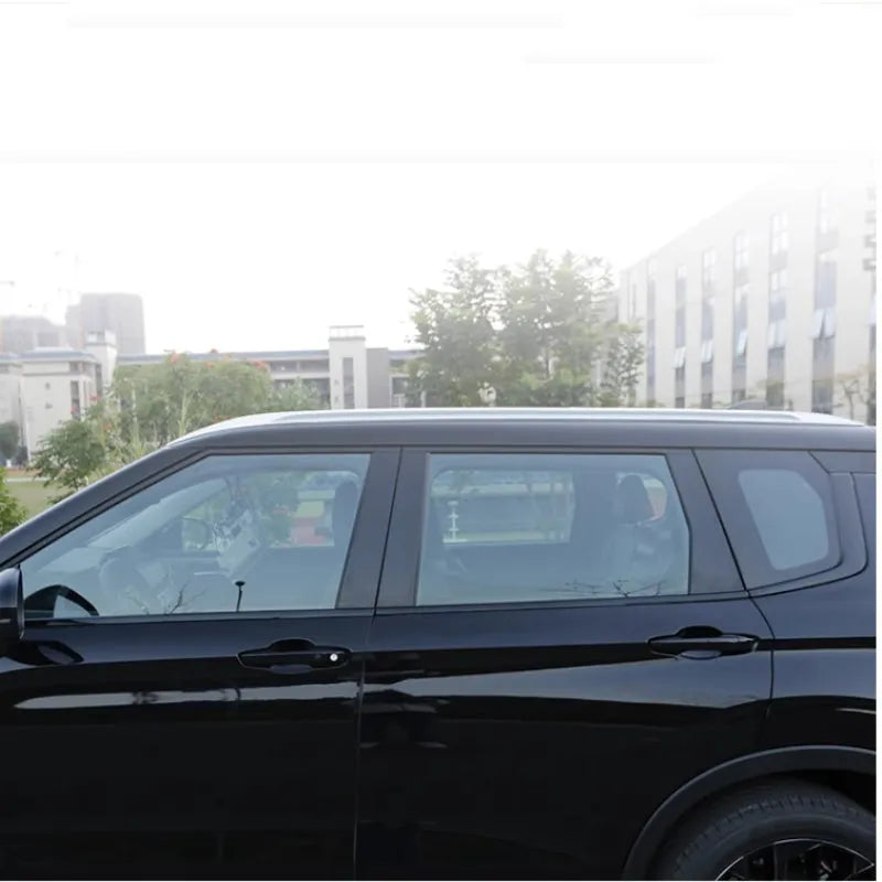 23 Mitsubishi Outlander car with protective film applied to door pillars in carbon fibre and bright black finishes