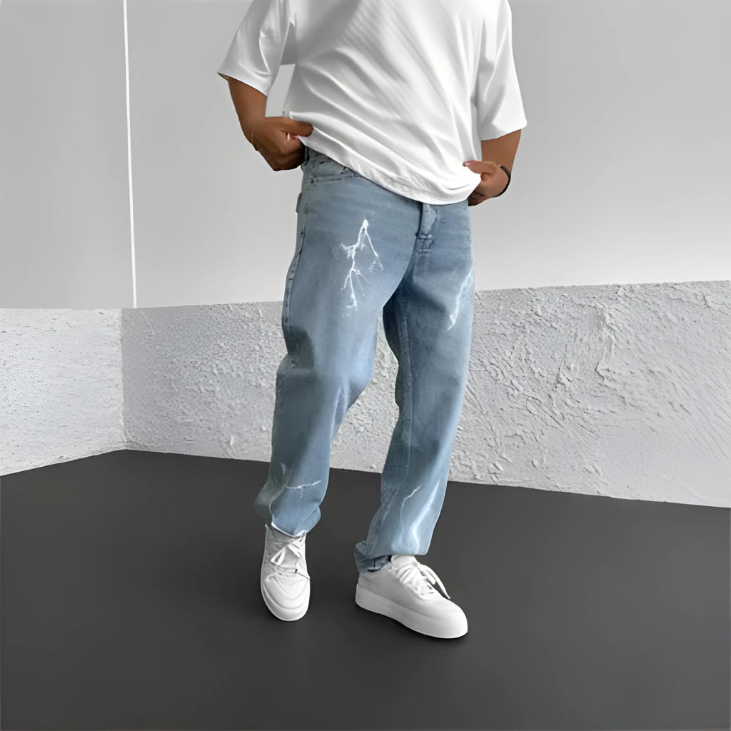 Men's straight-leg denim jeans in medium wash blue with zipper fly and mid-waist design