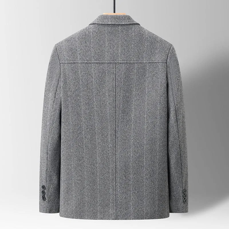 Men's slim lapel woolen jacket in gray with non-ironing finish and side patch pockets on a plain background