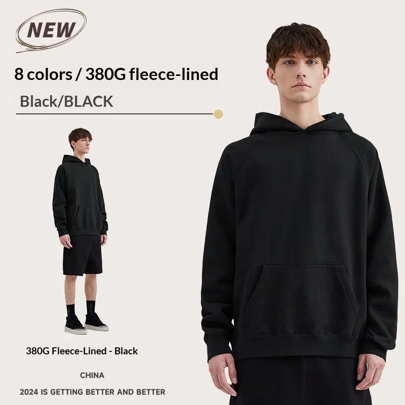 American Vintage heavyweight loose fit cotton hoodie with raglan sleeves and 3D patch pocket in 1977 Black Iron